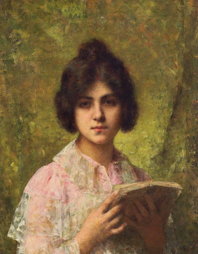 A young woman holding a book in living room