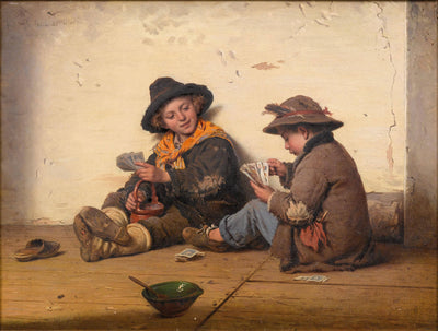 Children playing cards in entryway