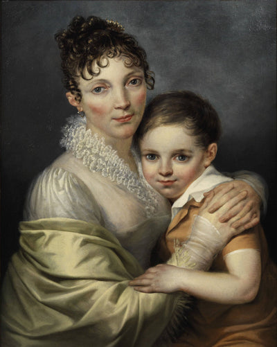 Double portrait of a mother with her little son in hallway