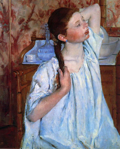 Girl Arranging Her Hair in dining room