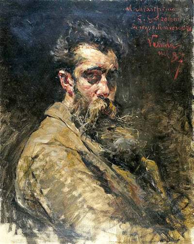 Portrait of the painter Giuseppe Garzolini in home office