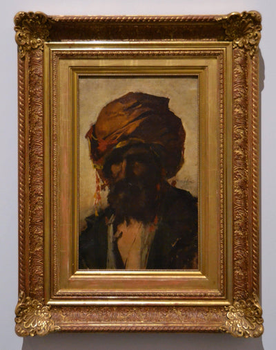 Moor with turban in kitchen