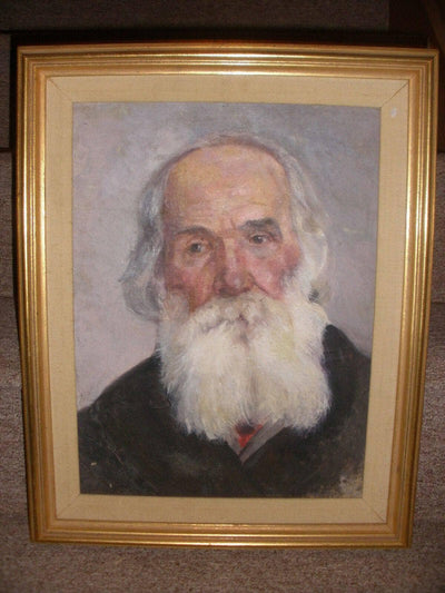 Portrait of an old man (possibly Lev Tolstoy) in dining room