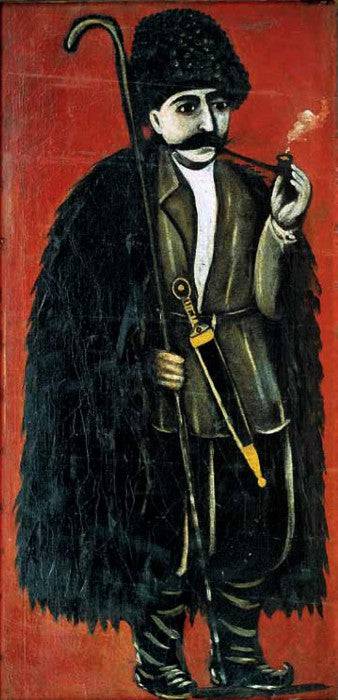 Shepherd in a felt cloak on a red background in dining room