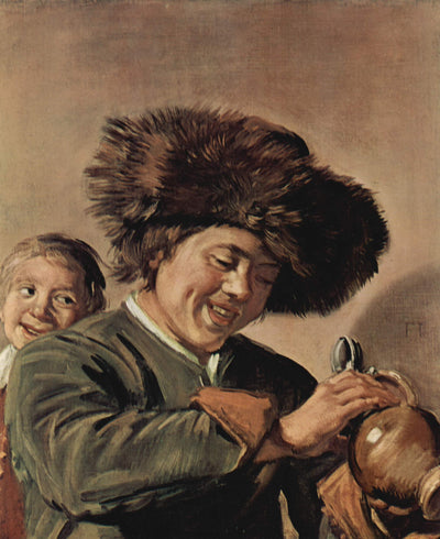 Two laughing boys with a beer mug in bedroom