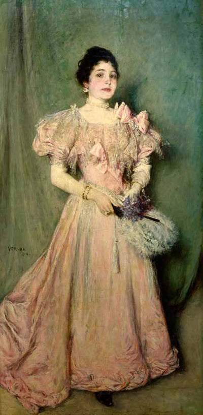 Woman in pink dress in hallway