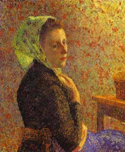 Woman wearing a green headscarf in apartment