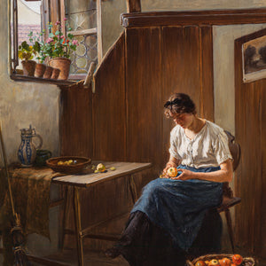 Young woman peeling apples