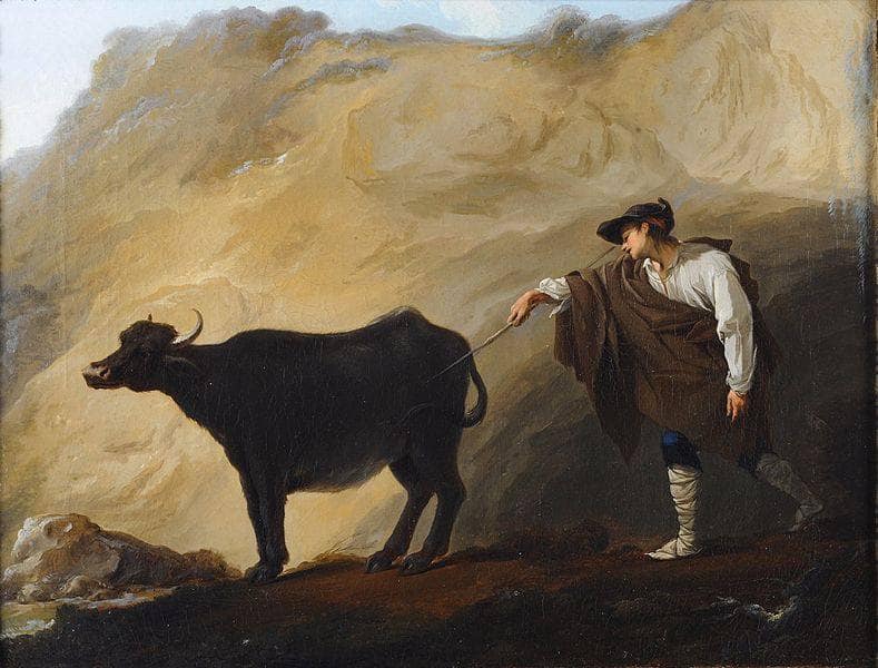 Shepherd and buffalo leaving a cave