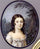 A girl standing before a tree with lilac, in white silk dress with white sash tied in a bow, long dark curling hair, forest and sky background in master bedroom