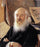A portrait of Dmitry Rovinsky in modern living room