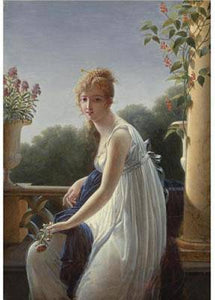 A young woman seated by a window