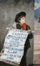 A London Newsboy in hallway