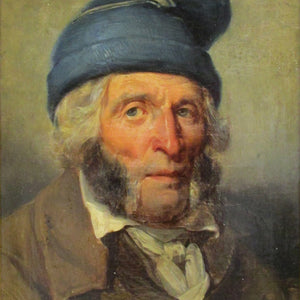 Portrait of man in blue cap