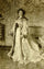 Full-length female portrait in modern living room