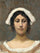 Girl in white bonnet in hallway