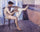 Man drying his leg in kitchen