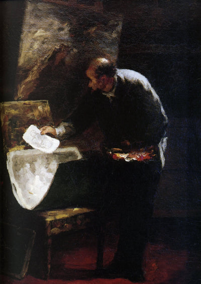Painter dividing into sheets a paperboard of drawing in kitchen