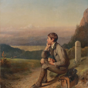 Portrait of a young boy in front of an alpine panorama
