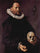 Portrait of a Man Holding a Skull in study