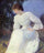 Portrait of a Woman in white in apartment
