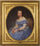 Portrait of a young woman sitting in a blue dress in dining room