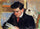 Portrait of Rodo Pissarro Reading in master bedroom
