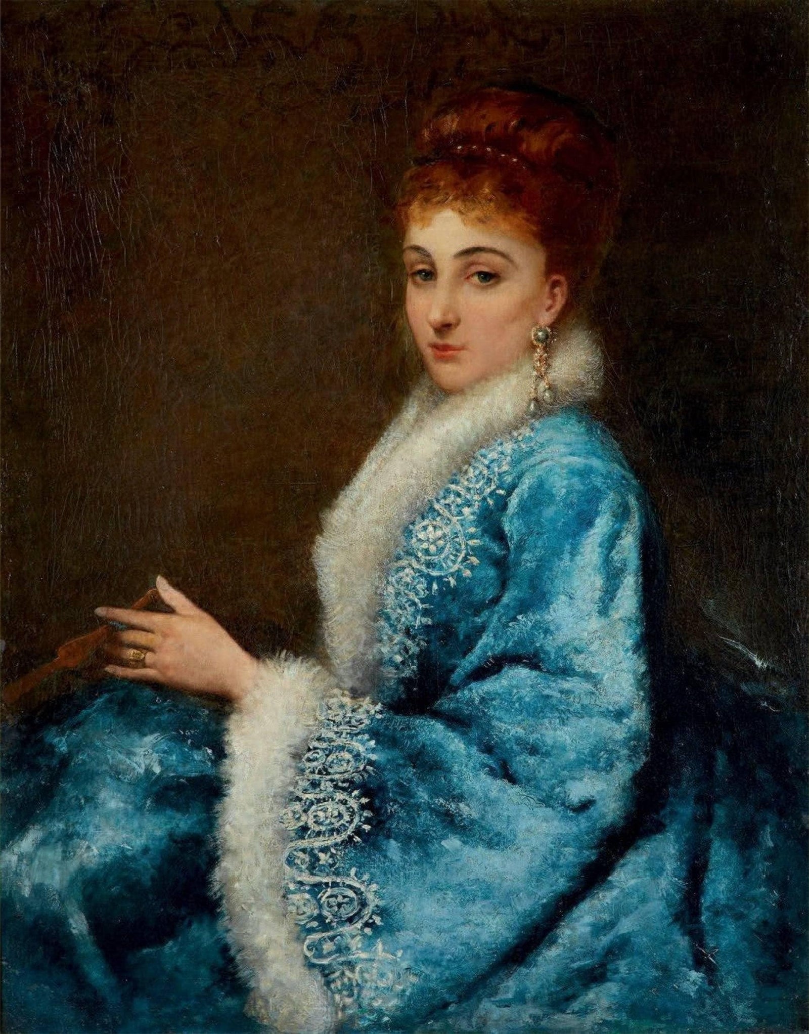 Portrait of young woman in blue dress