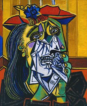Weeping Woman by Pablo Picasso, a woman's face broken into angular planes of yellow, green and blue, a white handkerchief pressed to her mouth, tears at her eyes and a blue flower in her red hat.