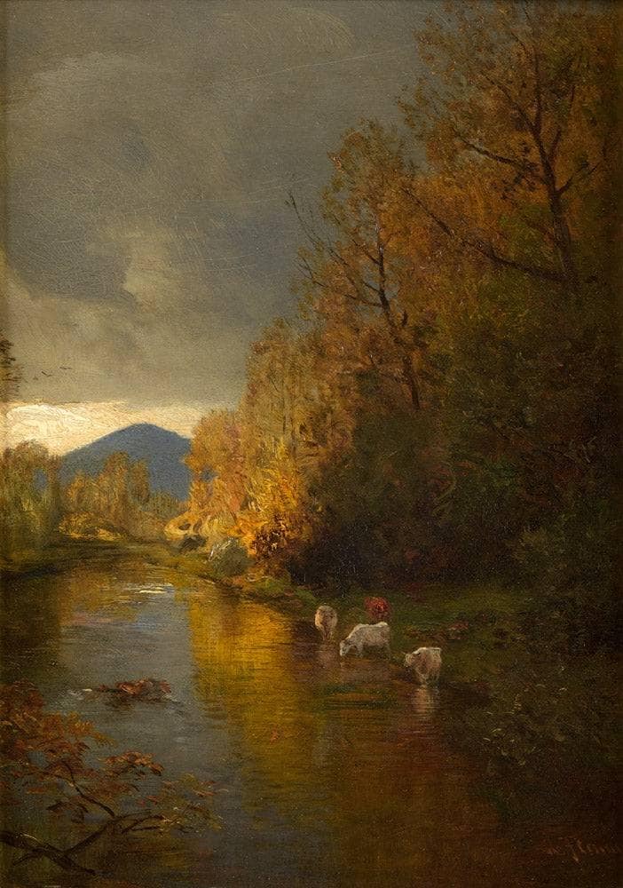 River landscape with grazing cattle