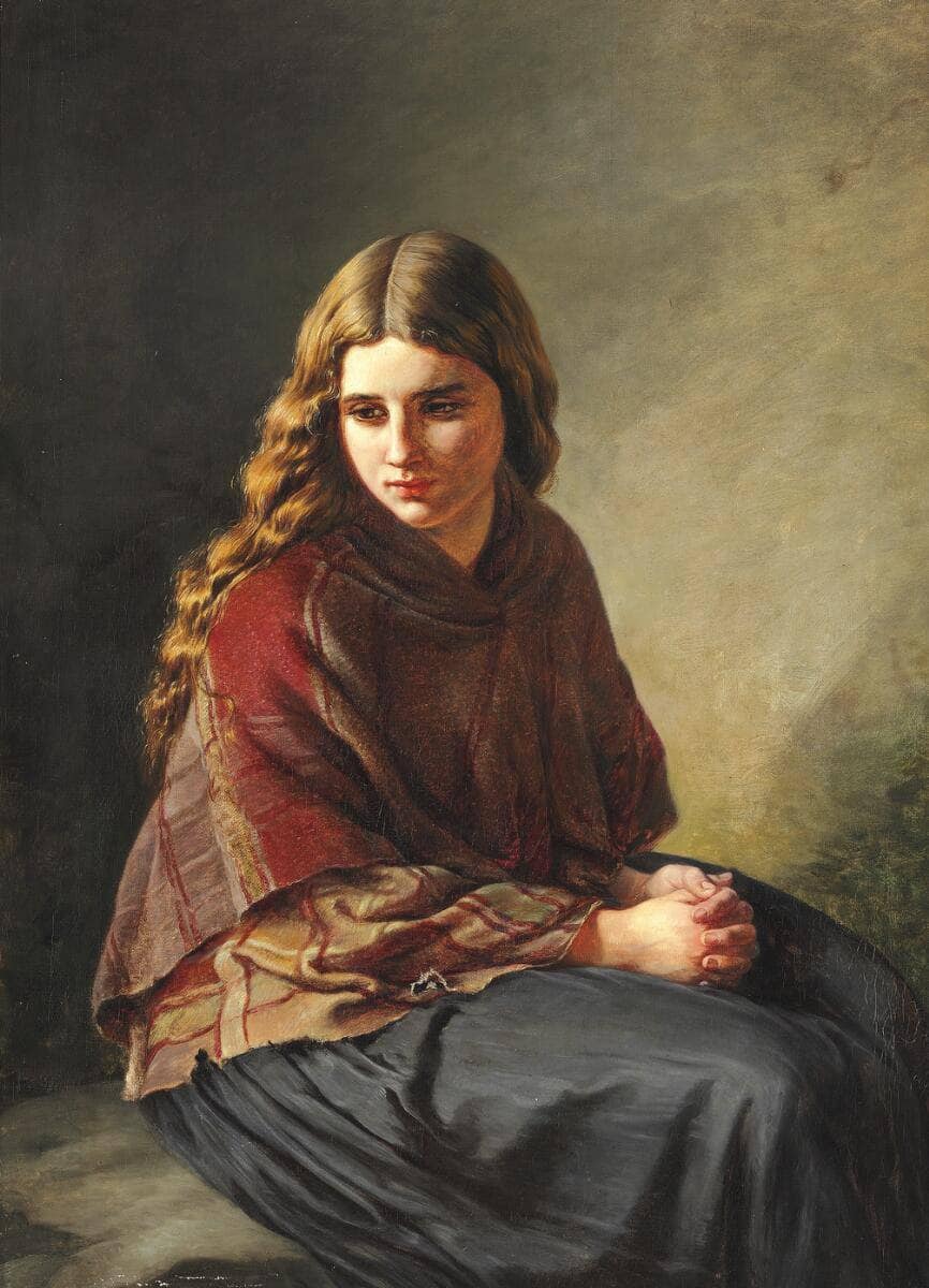 Seated girl with folded hands and a checkered shawl around her shoulders