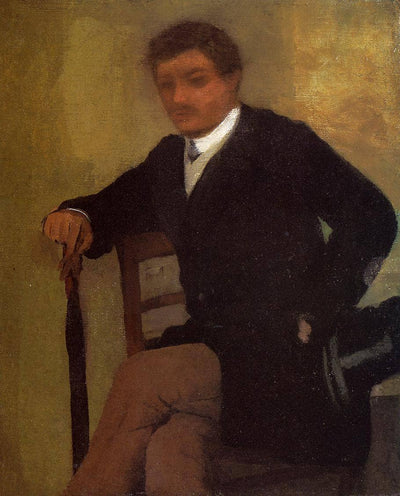 Seated Young Man in a Jacket with an Umbrella in home office
