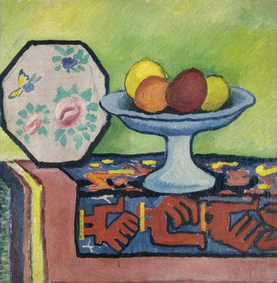Still life with bowl of apples and Japanese fan in apartment