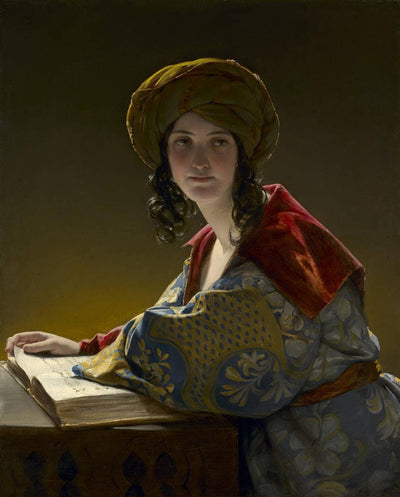 The young eastern woman in home office