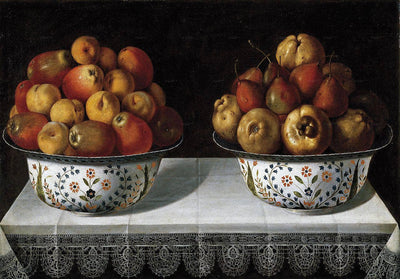 Two fruit bowls on a table in hallway