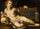 Vanitas - putto with a skull and an hourglass in home office