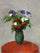 Vase of Flowers on a Red Tablecloth in home office