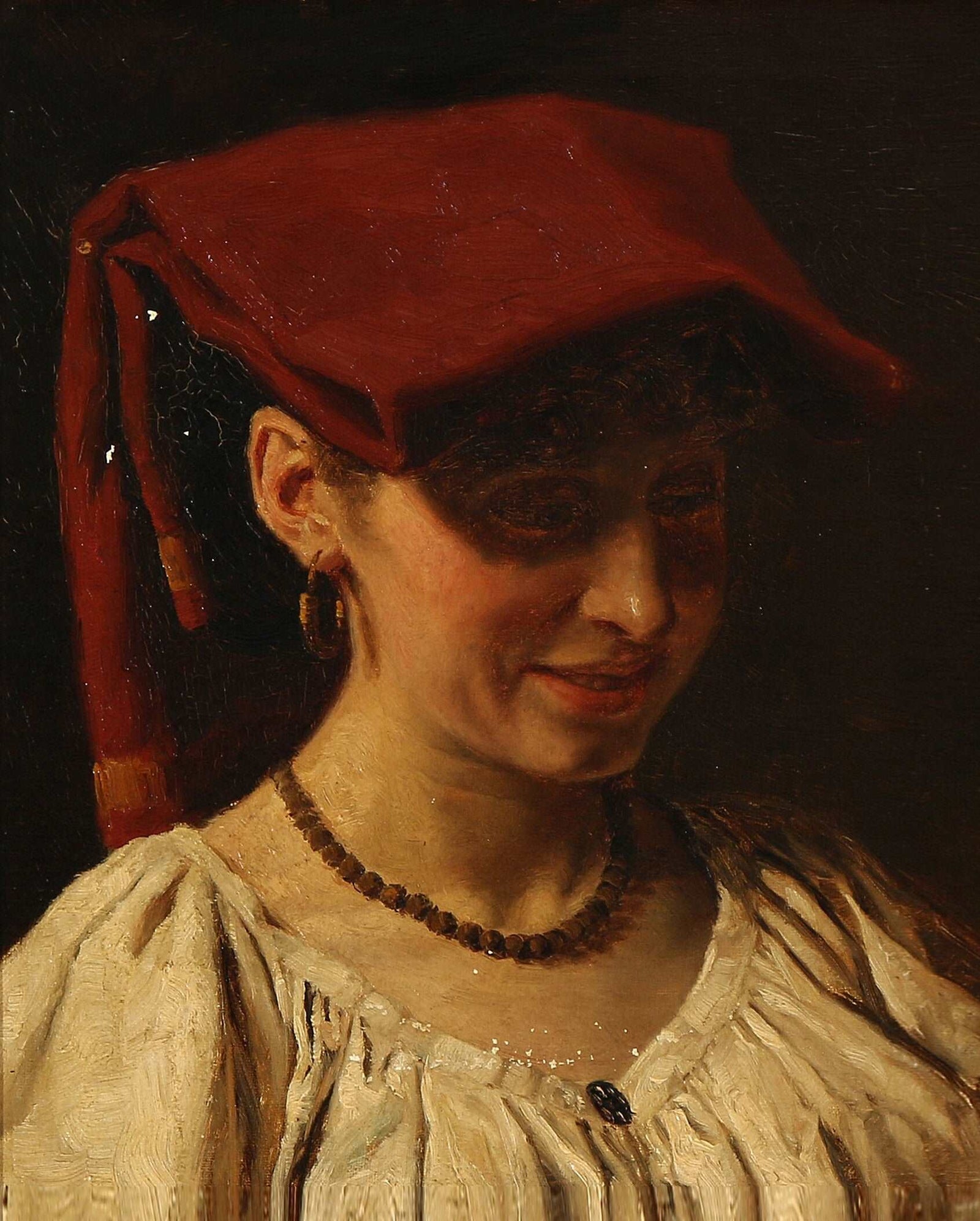 A smiling Italian woman with a red headscarf