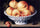 White Ceramic Bowl with Peaches and Red and Blue Plums in modern living room