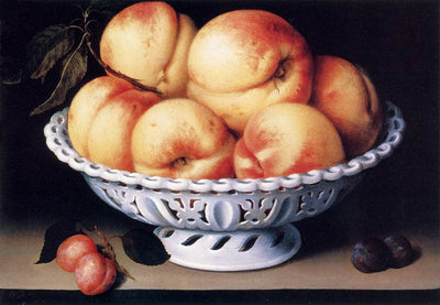 White Ceramic Bowl with Peaches and Red and Blue Plums in home office