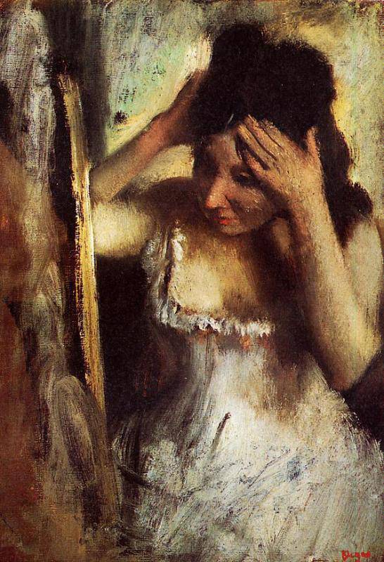 Woman Combing Her Hair in front of a Mirror - Edgar Degas