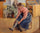 Woman Putting on Her Stockings in entryway