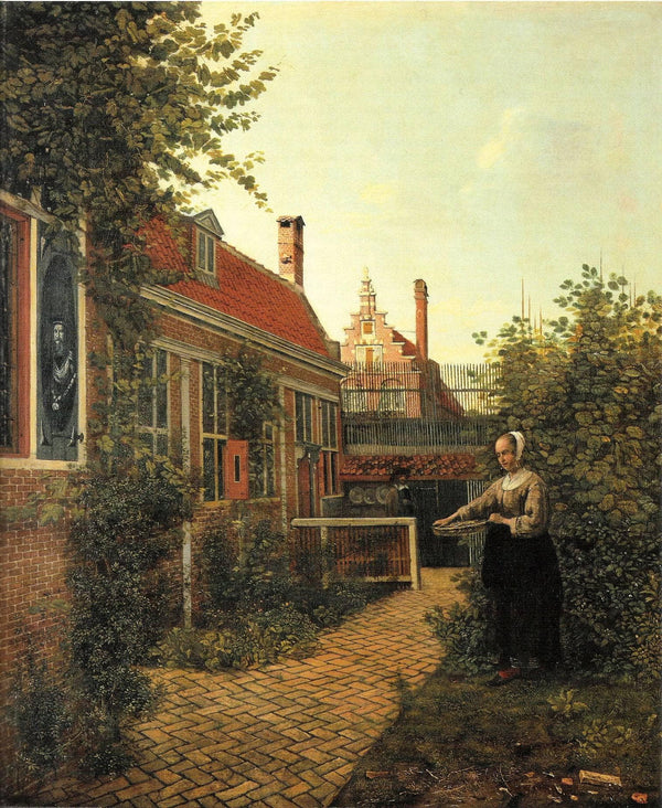 Woman with basket of beans in the kitchen garden
