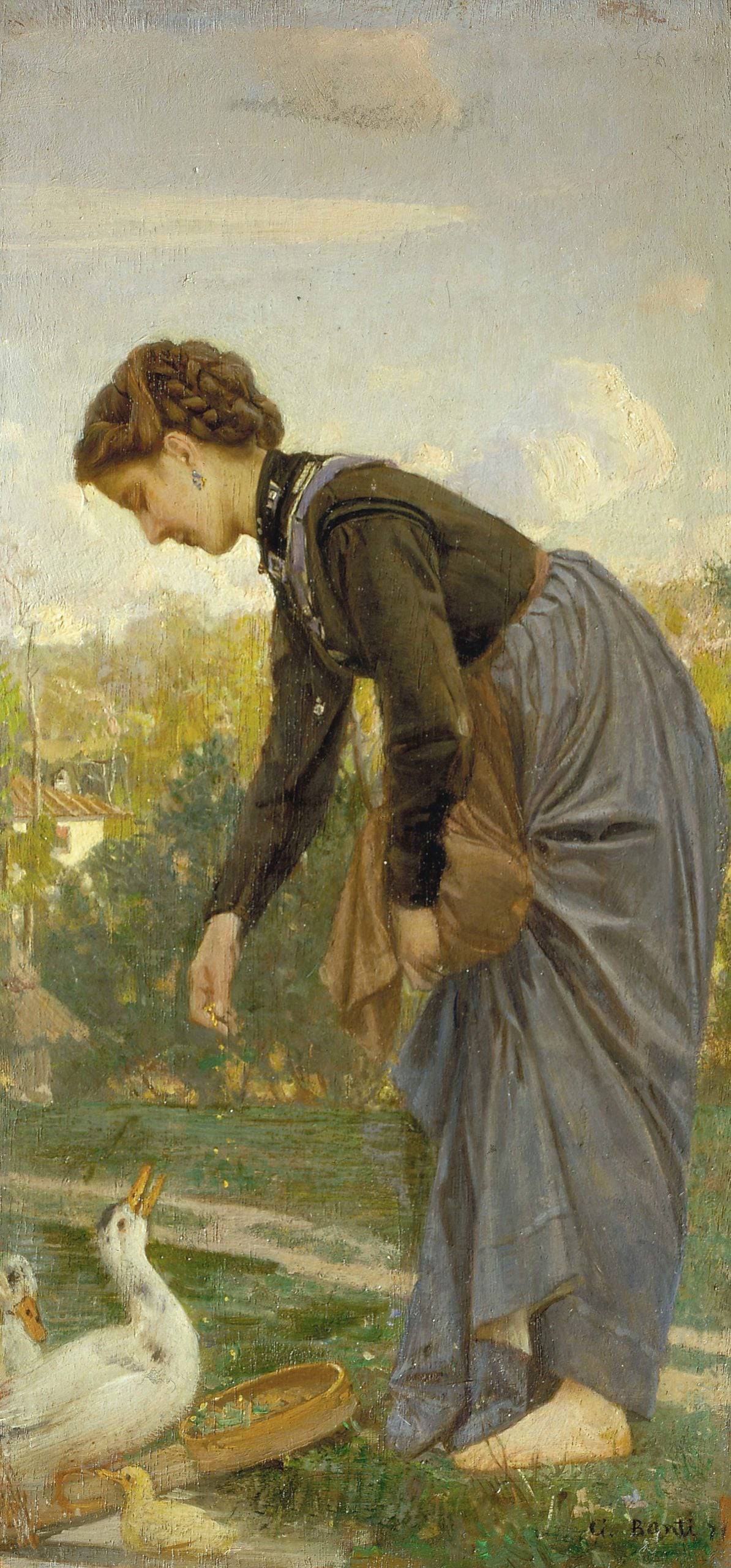 Young woman feeding the ducks