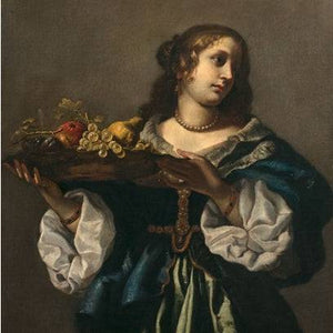 Young woman holding a fruit dish